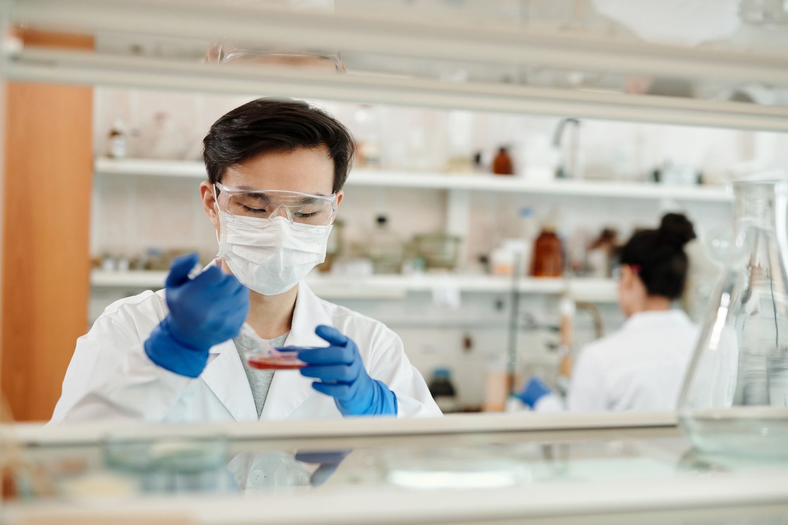 Analyst reviewing a sample in a pharmaceutical lab